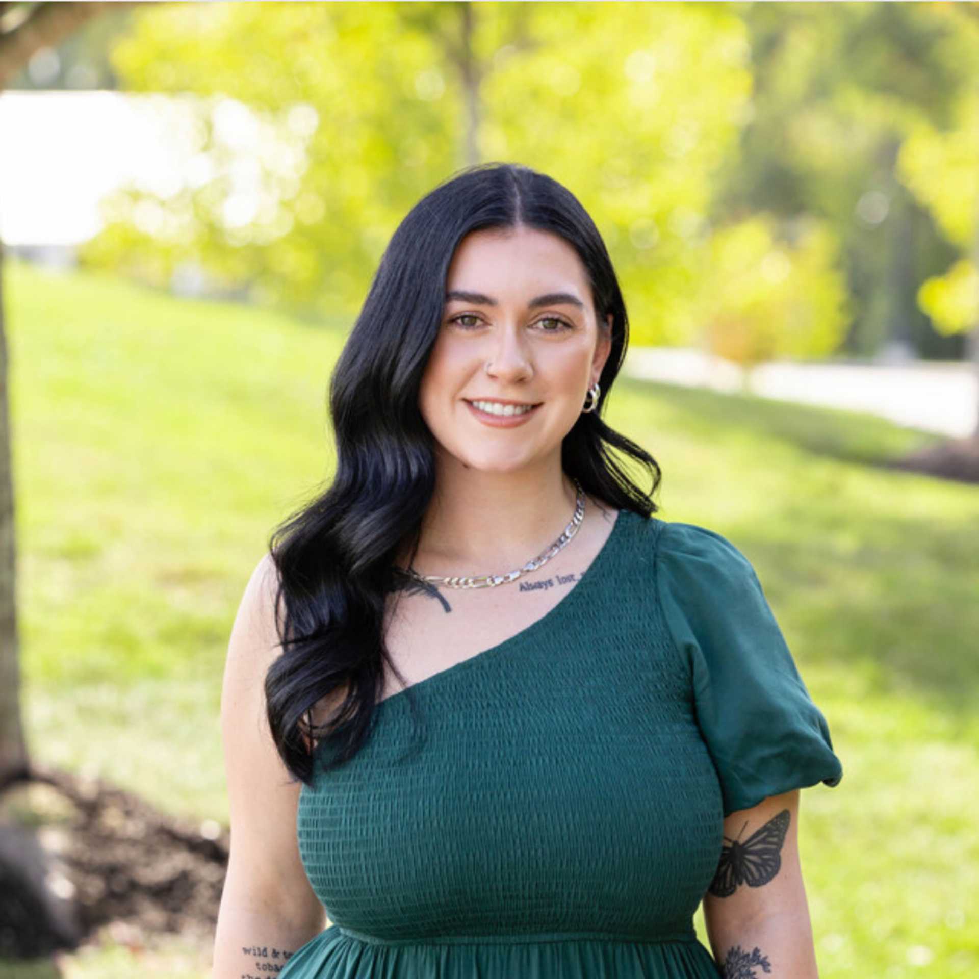 Portrait of Kayla S, a professional stylist at Spark Salon, showcasing their expertise and style.