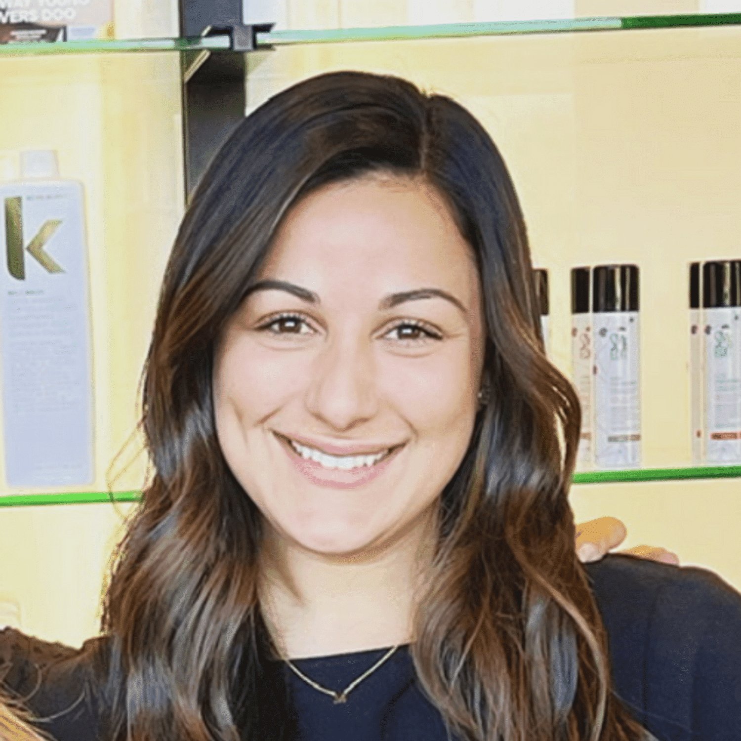 Portrait of Seana, a professional stylist at Spark Salon, showcasing their expertise and style.
