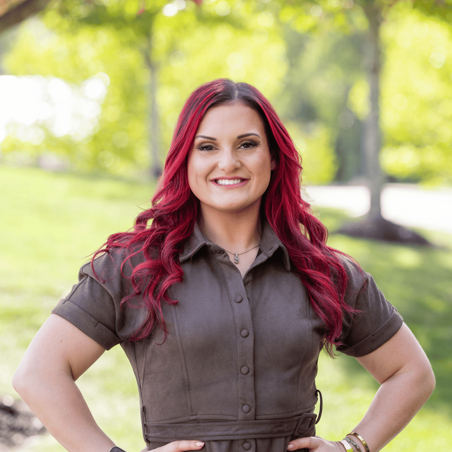 Portrait of Caeley, a professional stylist at Spark Salon, showcasing their expertise and style.