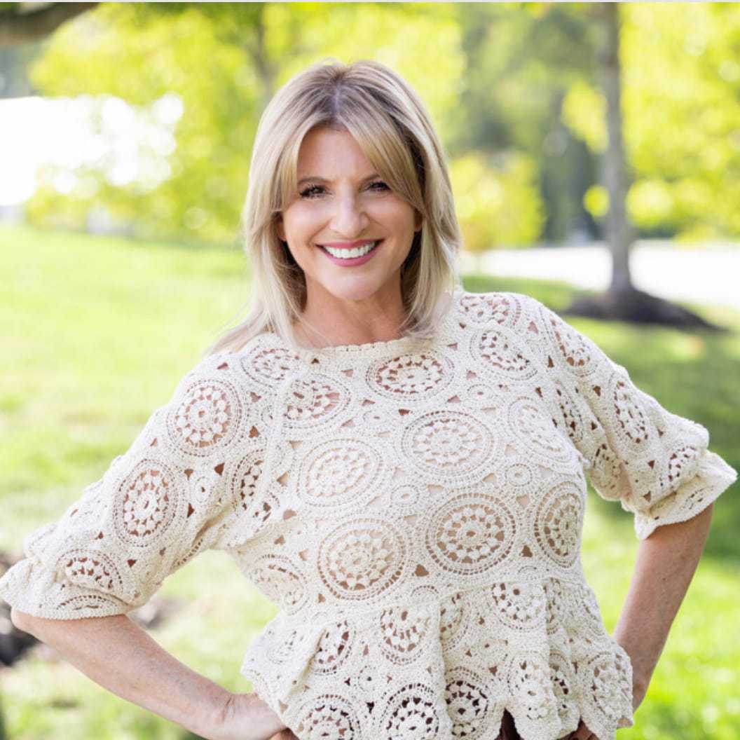 Portrait of Julie, a professional stylist at Spark Salon, showcasing their expertise and style.