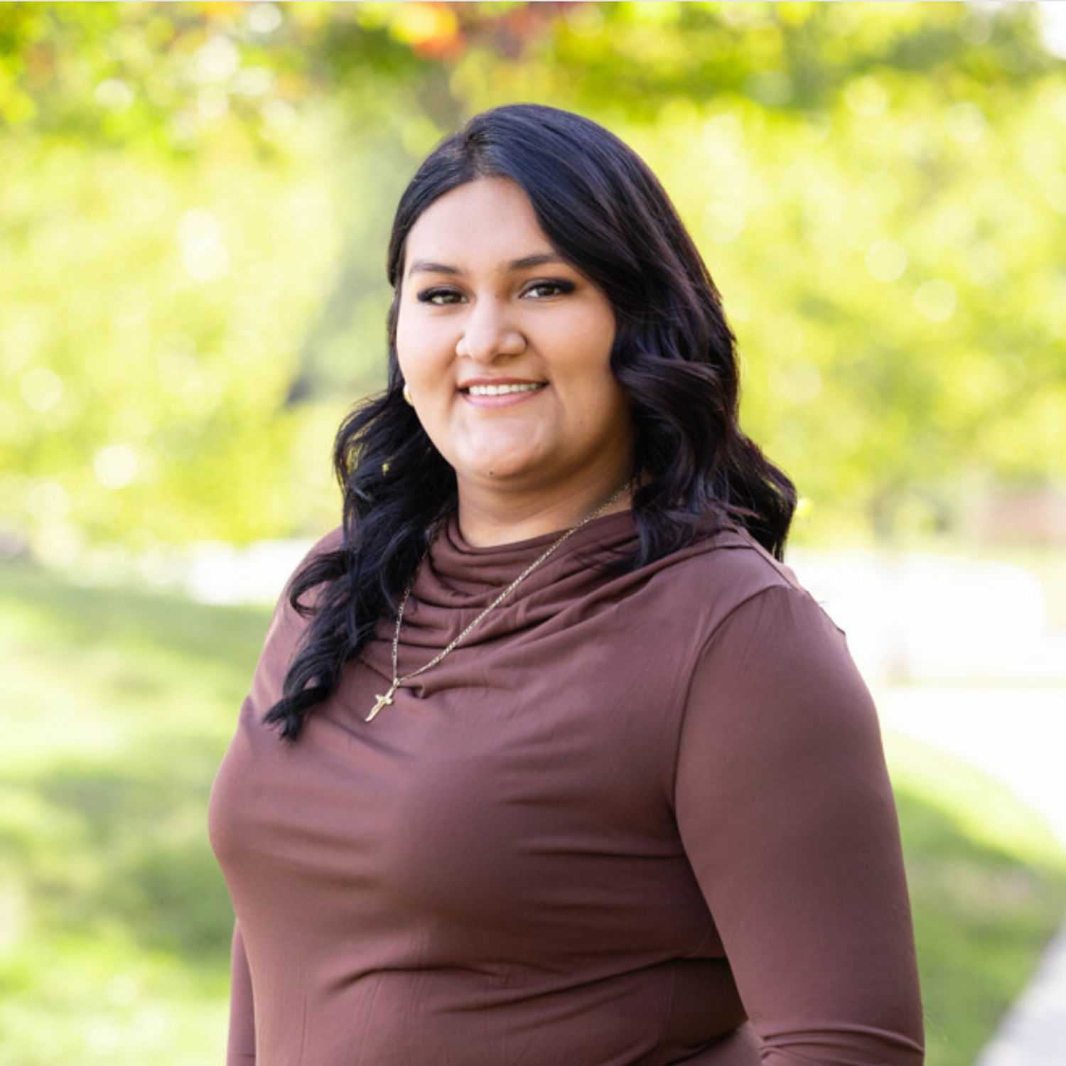 Portrait of Leslie, a professional stylist at Spark Salon, showcasing their expertise and style.