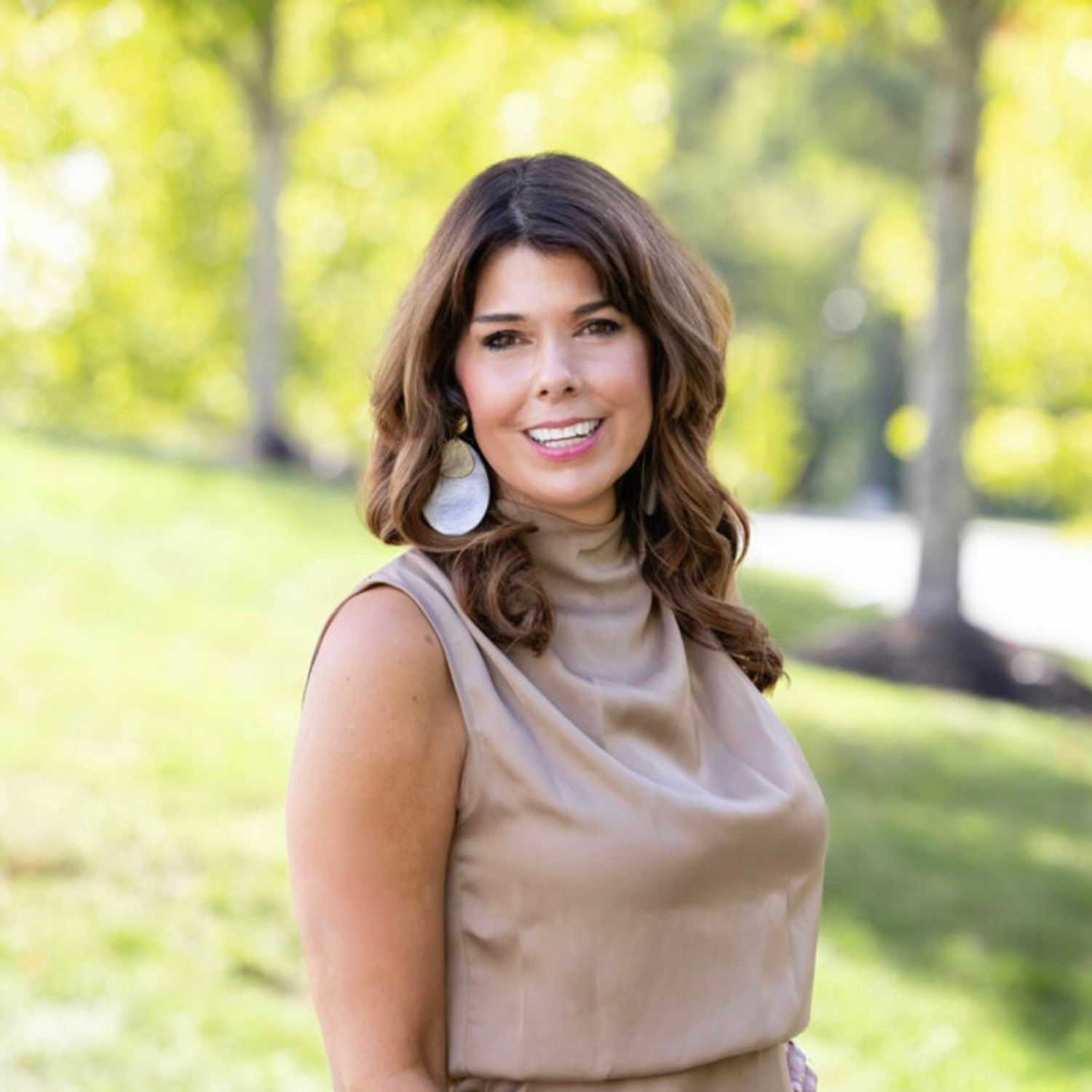 Portrait of Jen, a professional stylist at Spark Salon, showcasing their expertise and style.