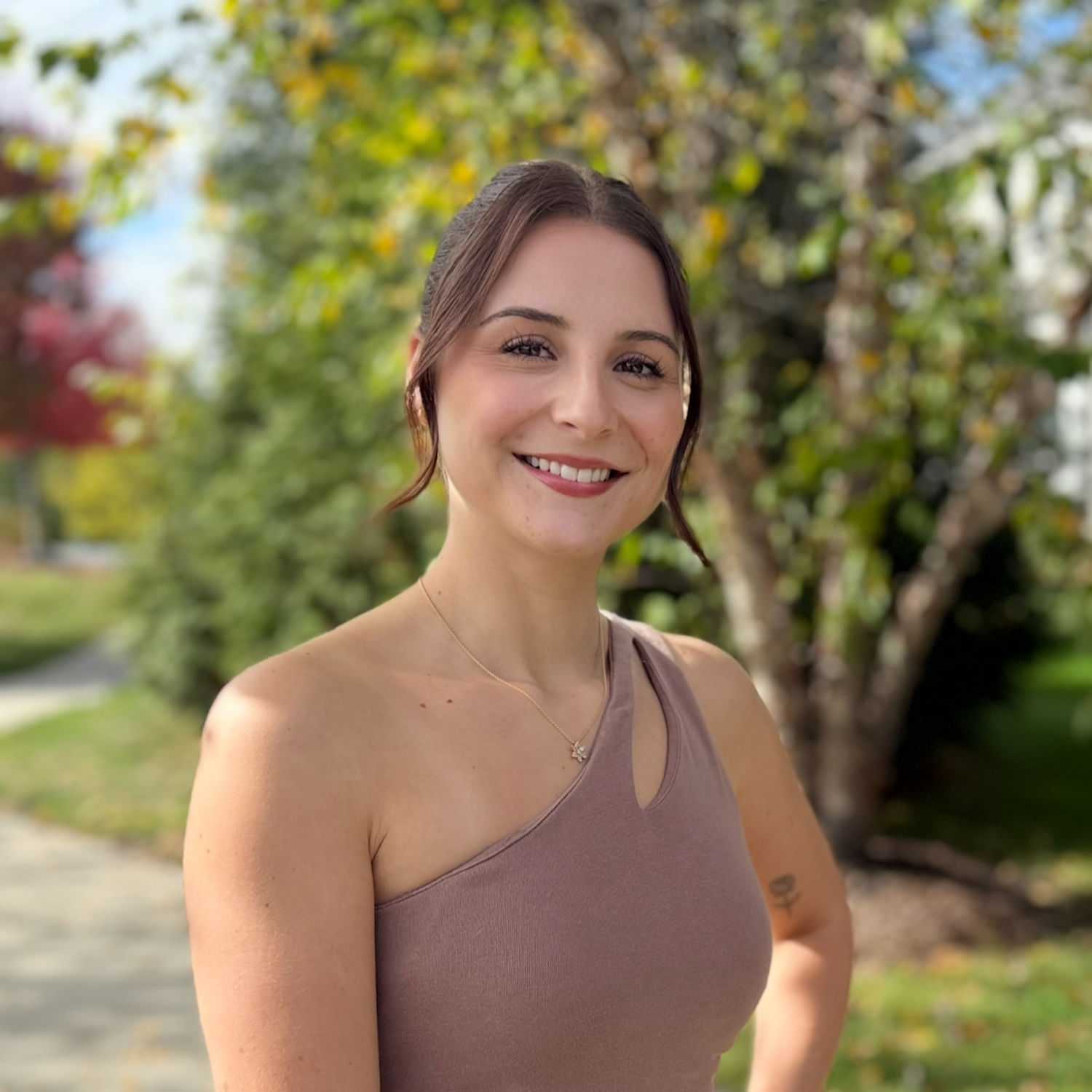 Portrait of Alissa, a professional stylist at Spark Salon, showcasing their expertise and style.